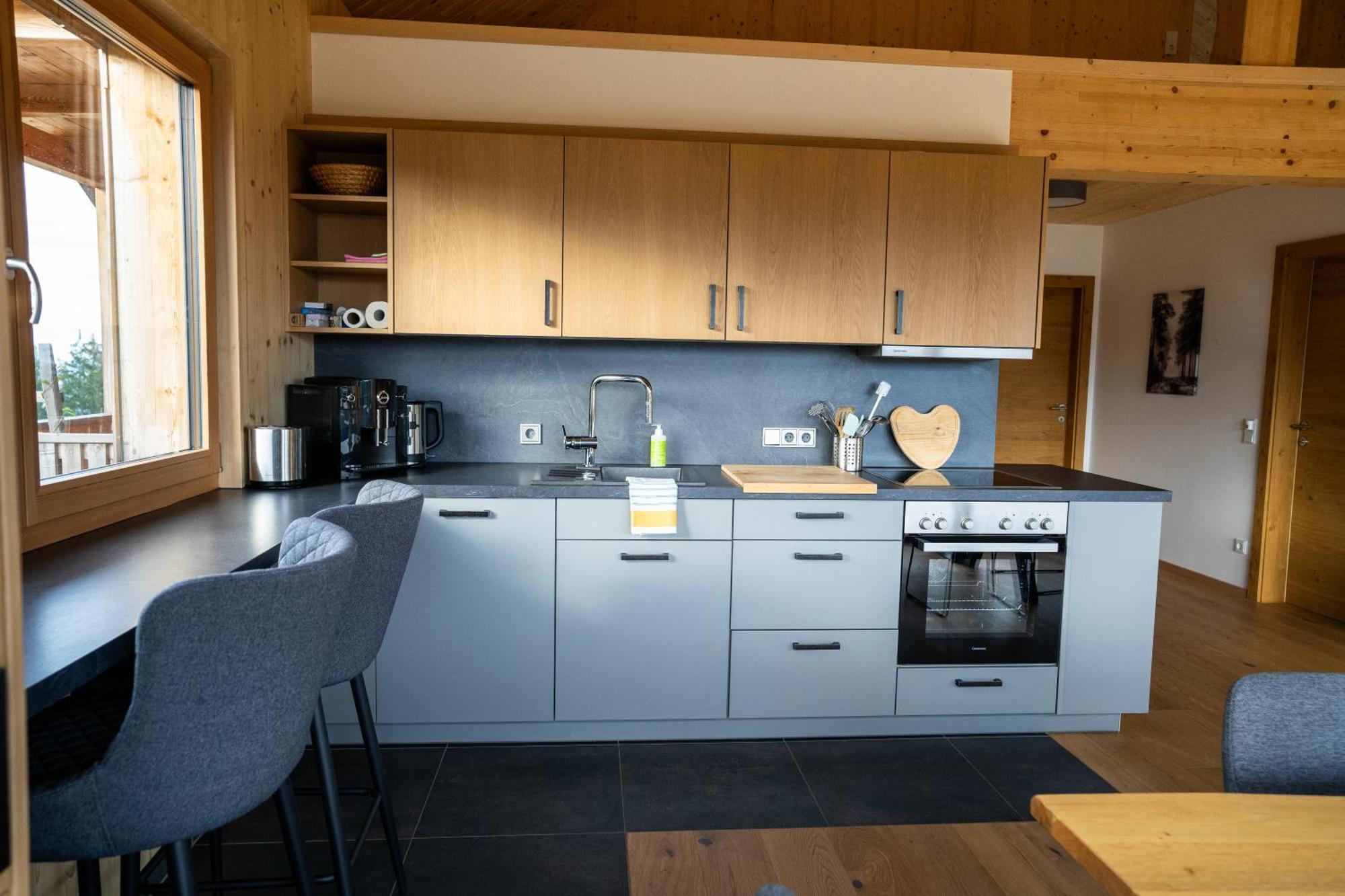 Holzhaus "Zum Schwarz'N" Apartment Aurach am Hongar ภายนอก รูปภาพ